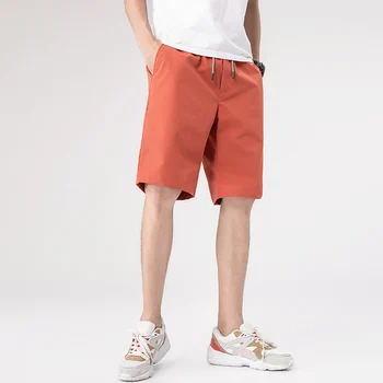 O coreano Moda masculina Cor Sólida 5-Ponto de Calças Para os Alunos Versátil Verão Nova Shorts Para Adolescentes Calças Soltas de Praia